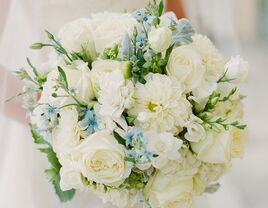 Stumped on picking a "something blue?" Consider choosing flowers in a blue hue for a pretty bouquet that's also a nod to this tradition.