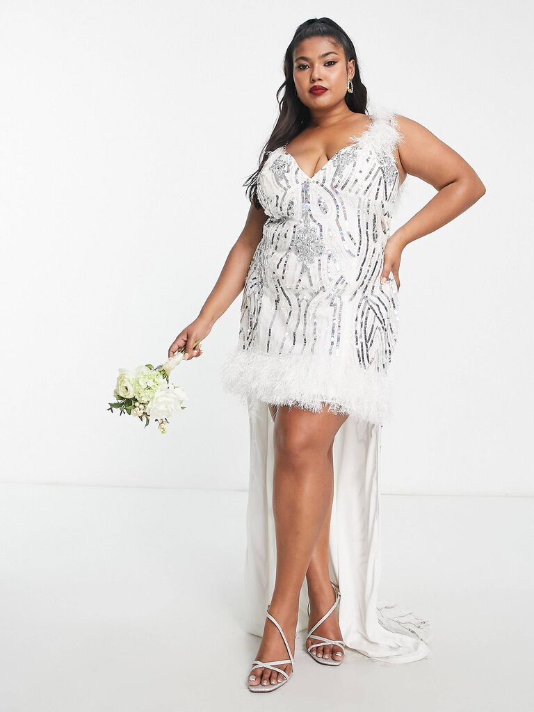 Mini plus size wedding dress with feather embellishments by ASOS. 