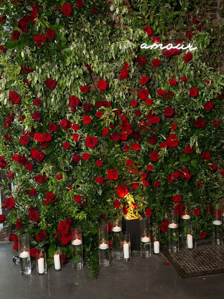 Rose bush and candles at a wedding reception.