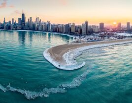 The sun sets over the waterfront in Chicago, IL.