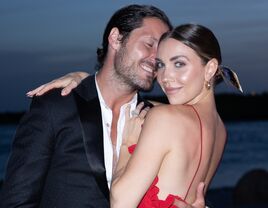 Dancing with The Stars Jenna Johnson in a stunning red jumpsuit with Val Chmerkovskiy