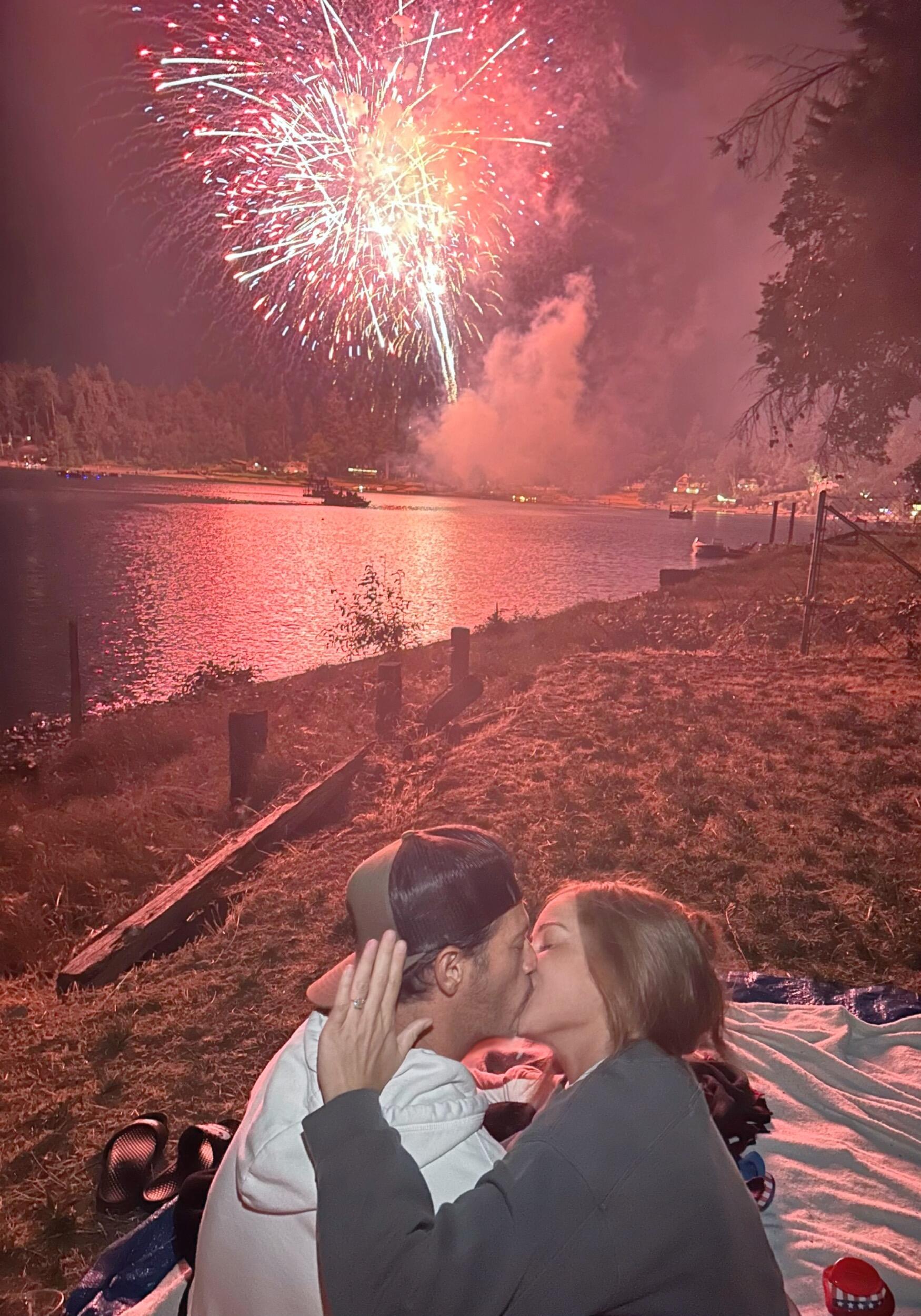 On the Fourth of July, Kyle proposed in the most intimate and perfect way. Surrounded by the peaceful water and warm summer air, they shared a private moment before celebrating the news with friends and family. Fireworks lit the night sky, it was the perfect end to the perfect  evening as they floated on cloud nine.