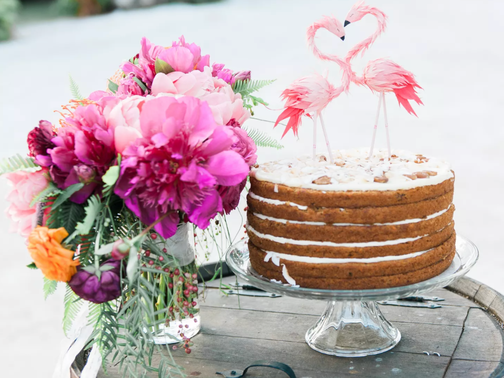 Pink Flamingo bridal shower cake with pink flower bouquet