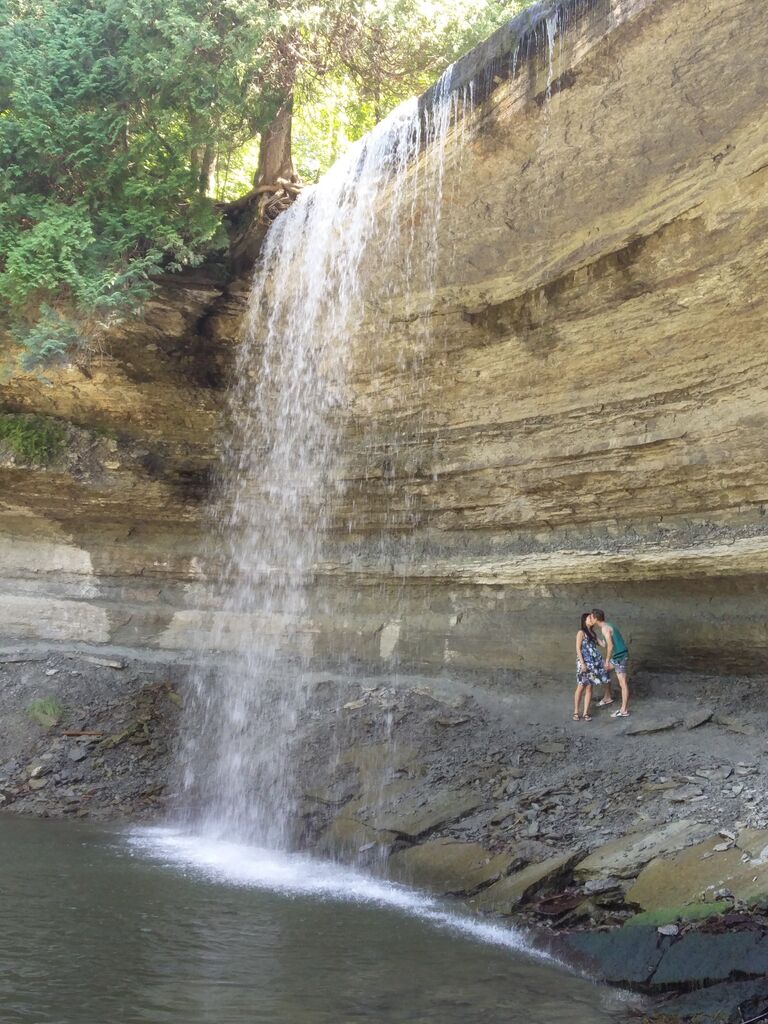 They say don't go chasing waterfalls, but we did and found out that waterfalls are quite cold and a little painful. But Kristy still liked the cottage life Mike introduced her to. (Manitoulin Island)