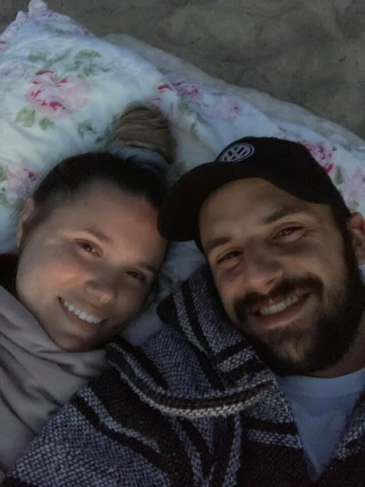 Laying on the beach  

"Two years with this guy and a spontaneous middle of the night trip to Lake Michigan to watch the sunrise"