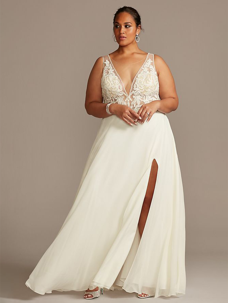 Chiffon wedding dress with slit and plunging neckline and floral applique