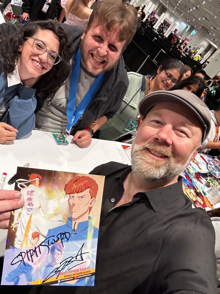 Another first: Erika took Andrew to Comic Con for the first time and got an autograph from one of their favorite Anime Dubb Voice actors! 