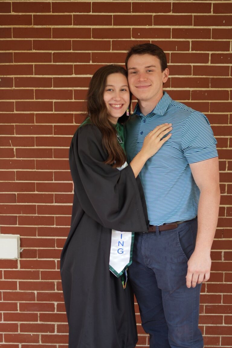 Emily graduates from college.