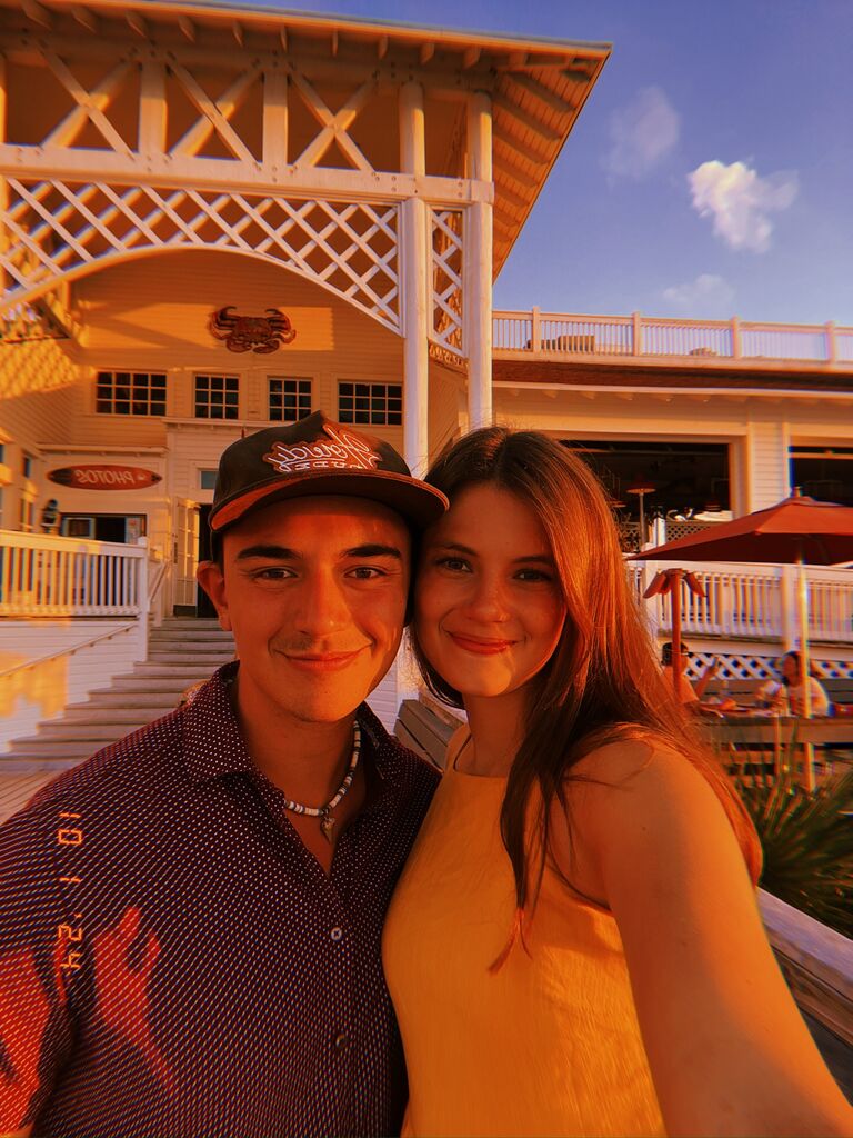 After a month of long distance, Timothy joined Molly's family on a vacation in Florida. 