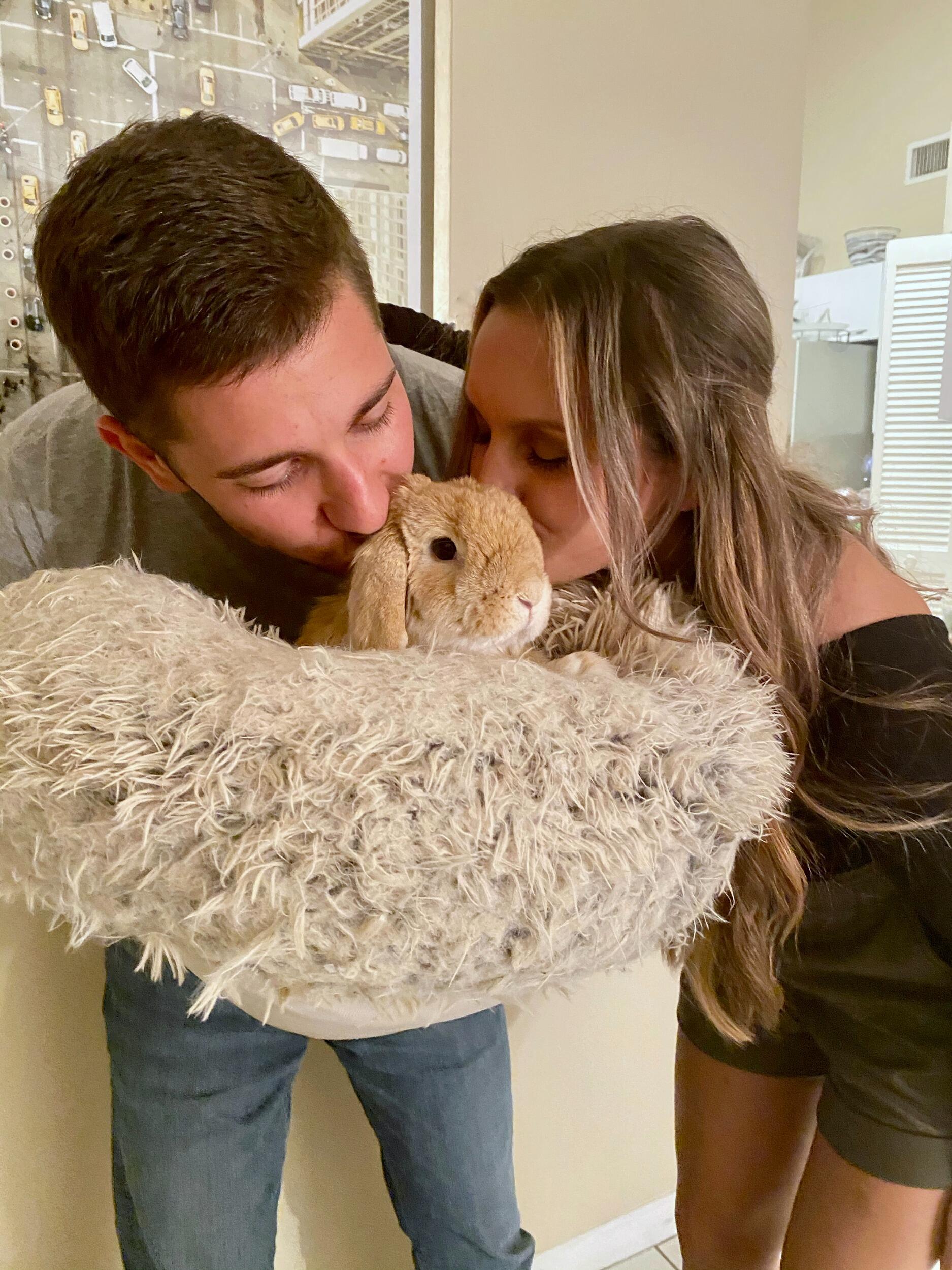 Lola went everywhere with them... even on walks!