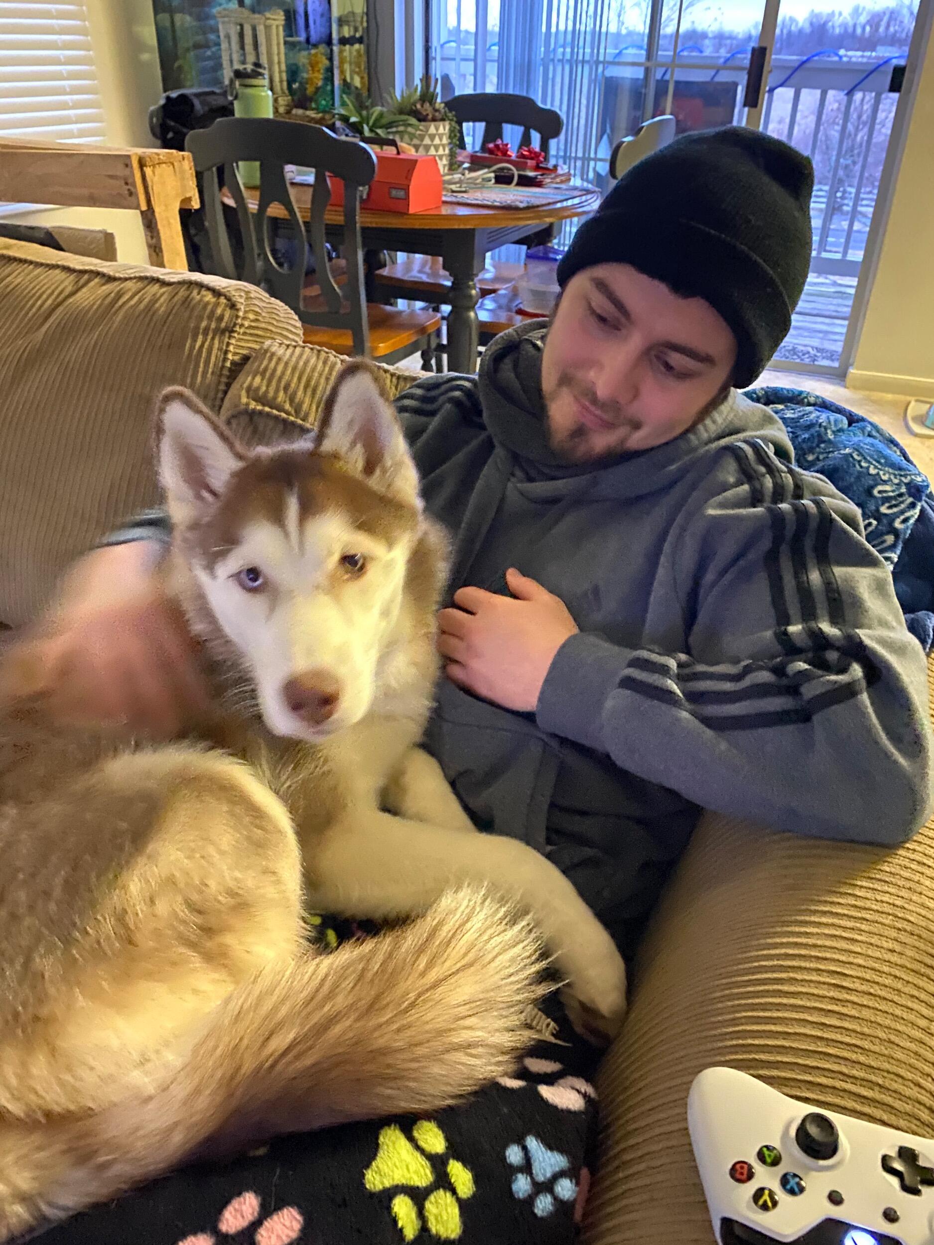 Maya getting snuggles in our first apartment together!