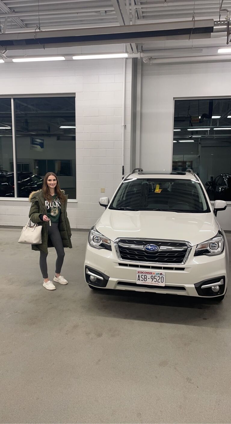 Katie buying her first nice car.