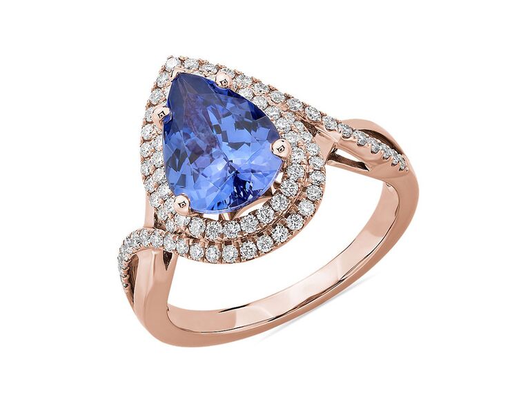 blue nile tear drop shaped  tanzanite engagement ring with double tear drop shaped round diamond halo and rose gold and round diamond twisted sides