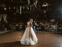 Bride and groom during first dance at wedding reception