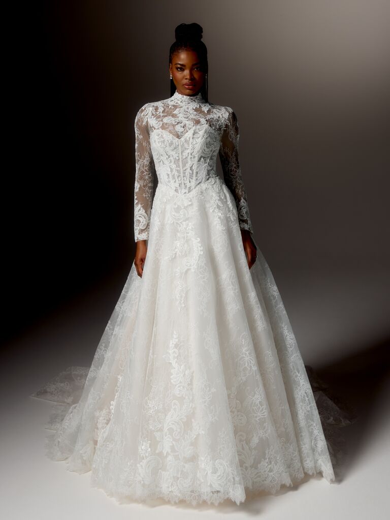 Sweetheart neckline wedding dress with boning and removable long sleeve floral bolero by Justin Alexander