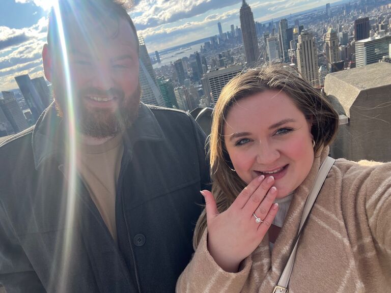 Getting engaged on top of the rock in NYC.