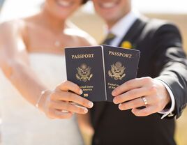 Couples with passports for honeymoon 