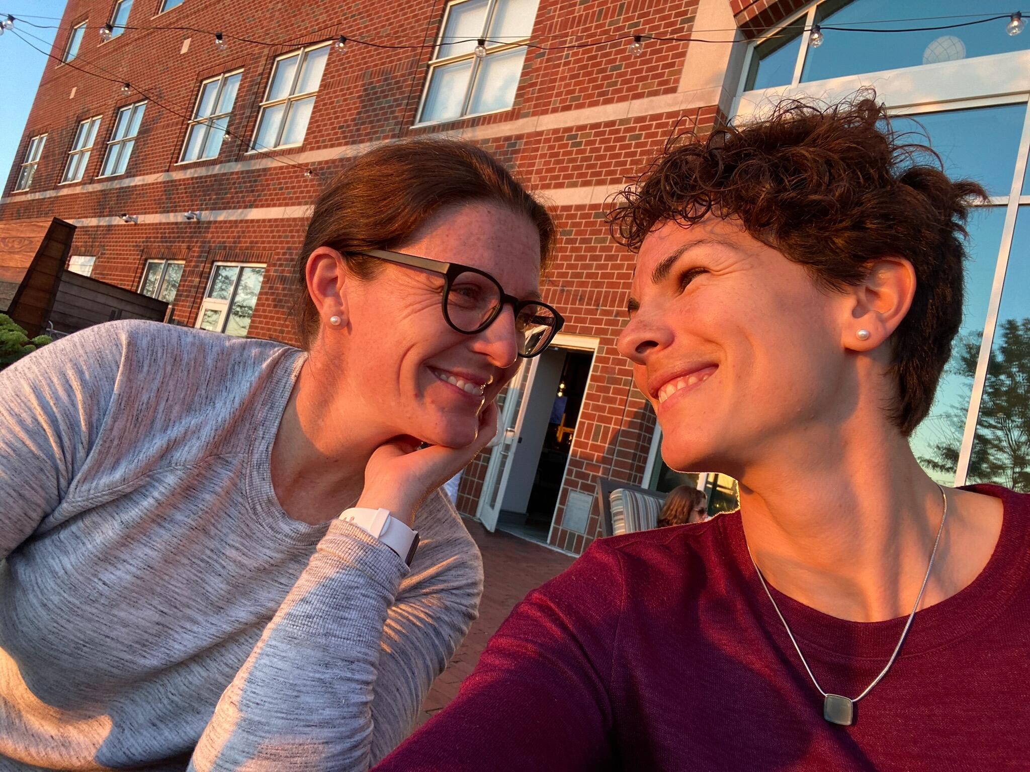 Enjoying their favorite spot to watch a sunset in Boston (The Hyatt Harborside Boston) Kelly seemingly thinking this was the night!