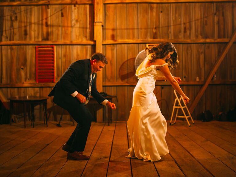 Dad and daughter in a coordinated dance during the reception