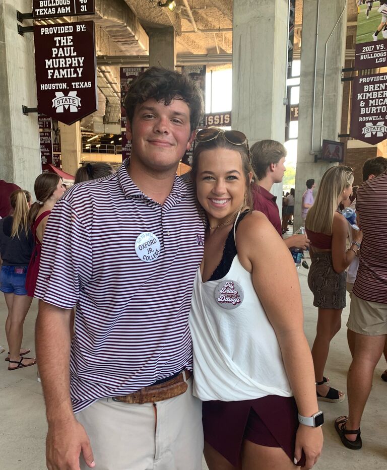 We first met at a friend's house in Starkville right before I was going home for the summer. We stayed in touch but did not see each other again until the start of the fall semester. This is us at our first MSU football game together!!!
