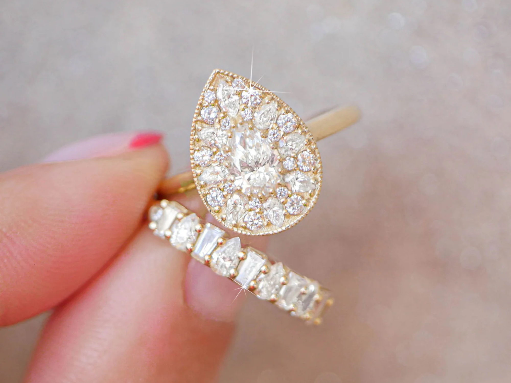 Pear shape diamond ring and round diamond wedding band plus size bridal ring set from Berlinger