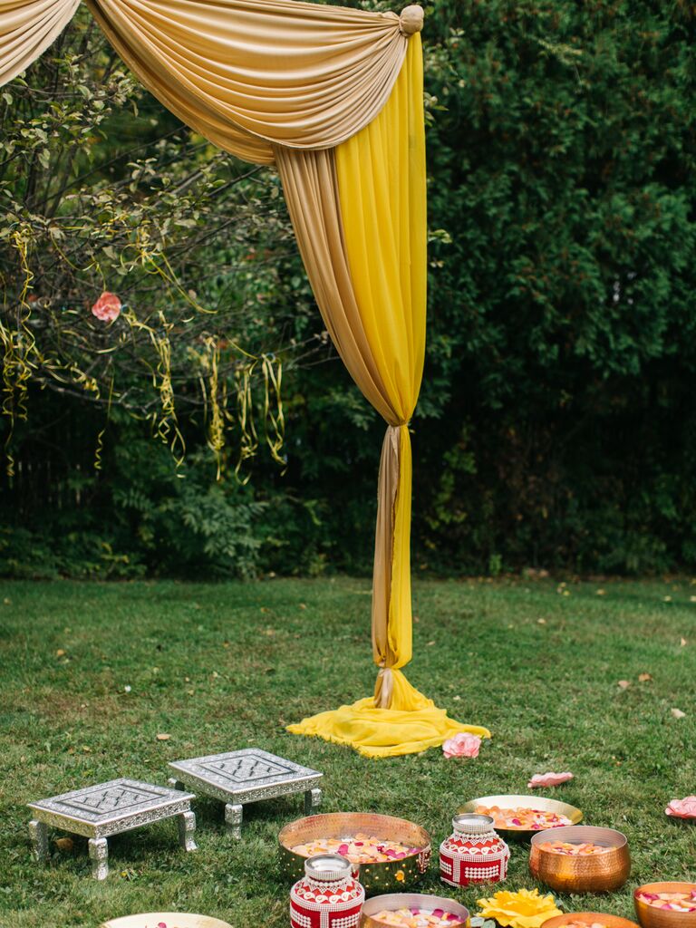 gold draping for haldi ceremony arch