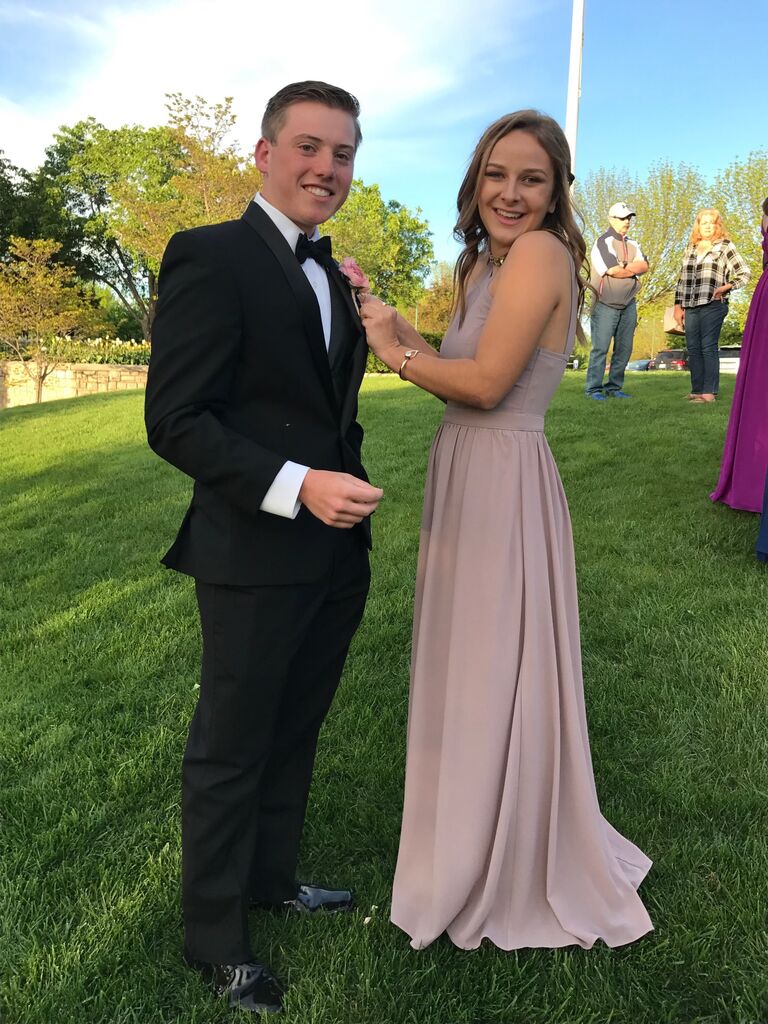 Lindsay: "Nick and I were friends all throughout middle and high school. He was a total nerd, and I was always looking to one-up him when it came to calculus tests. Our story really began when Nick asked me to prom. He was (and still is) such a sweet and genuine guy that I couldn't resist agreeing to date... JUST for the summer. We had both already committed to attending different colleges in the fall!"