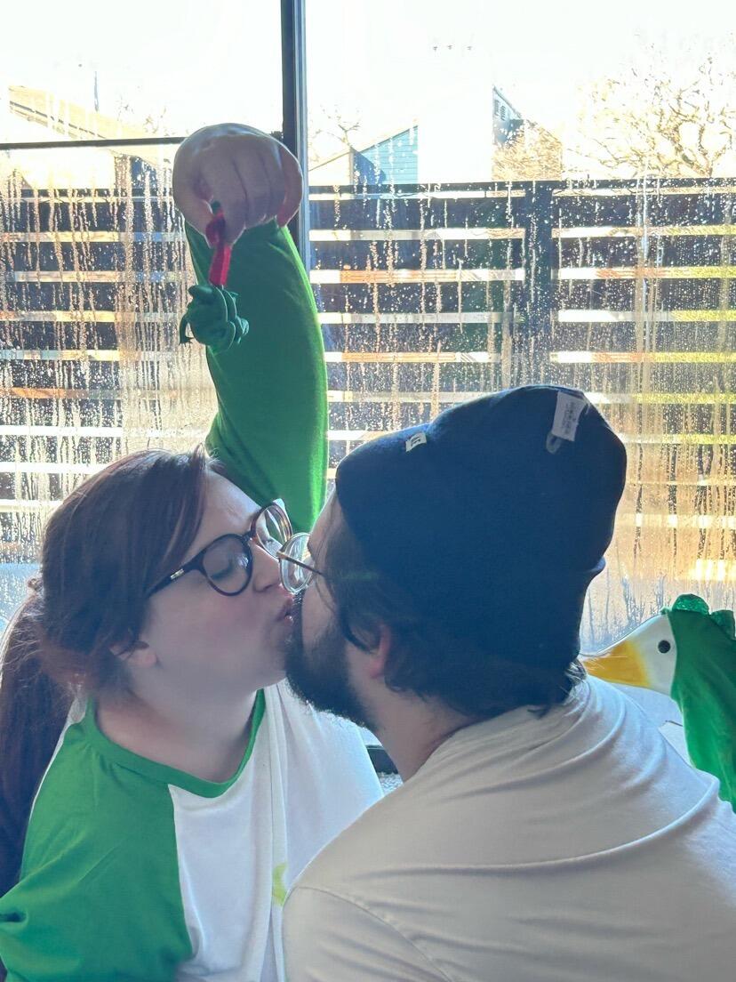 Christmas 2023! Grace and Brandon kiss under a "missile-toad" Brandon gifted Grace.