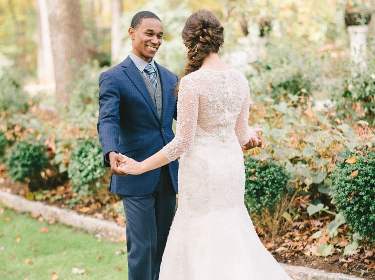 Bride and groom holding hands