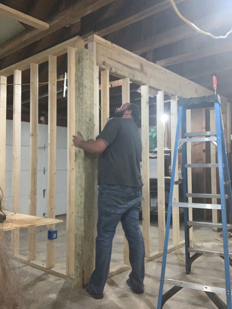 Framing the second bedroom, and installing support beams