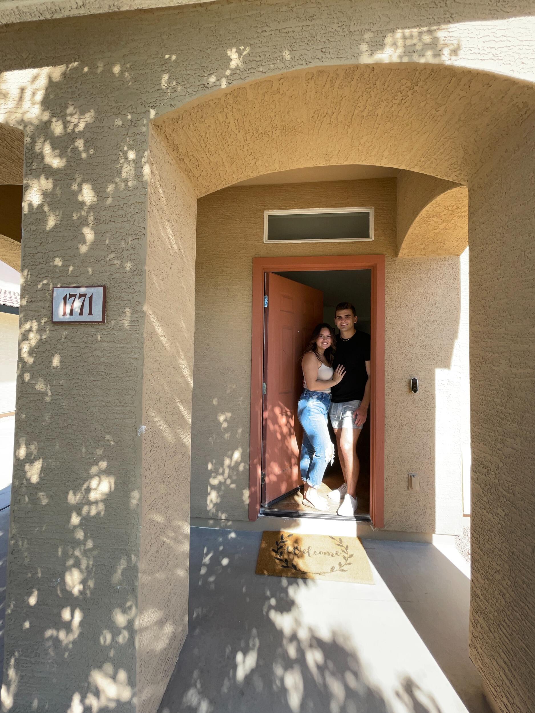H: After a year of apartment life, we were ready to invest in our future together. We bought our first home! Honestly, I didn’t even recognize it in this photo because we’ve been slowly renovating it. Now, the outside is white with a navy door—our perfect first home.
_______________________________________________
B: We were incredibly grateful to get to have a home together after living the apartment life. I spent so many days going up three flights of stairs, carrying water jugs, etc. It was such a blessing to feel like my life with Haley was continuing to move forward.