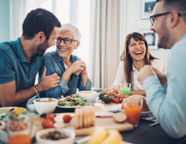 Couple having dinner with their future in-laws