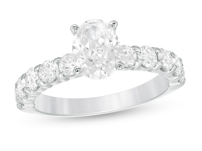 timeless oval engagement ring with embellished band 