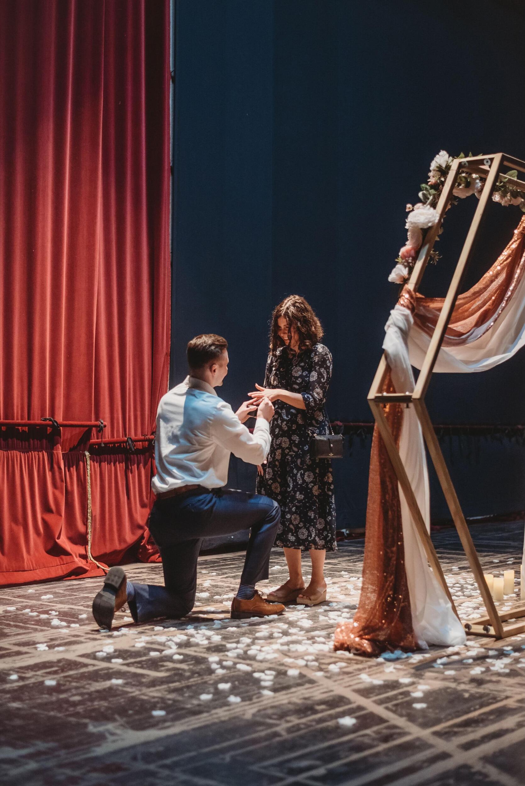 Max proposed to Joanna on the stage of the Akron Civic Theater, where Joanna grew up dancing The Nutcracker each year. He invited her close family and friends to surprise her as the curtain rose!