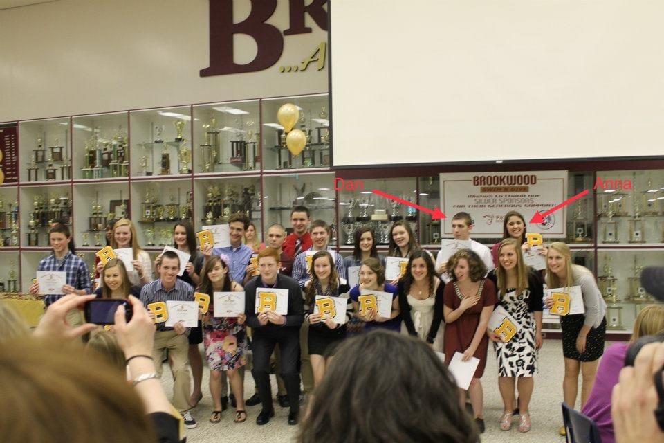 We first met in 2011, while members of our High School’s swim team. While we never really interacted in high school, here is a group picture with the two of us standing right next to each other!