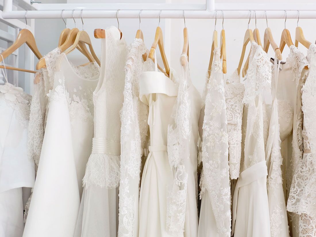 Wedding dresses hanging on rack