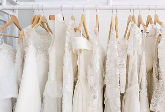 Wedding dresses hanging on rack