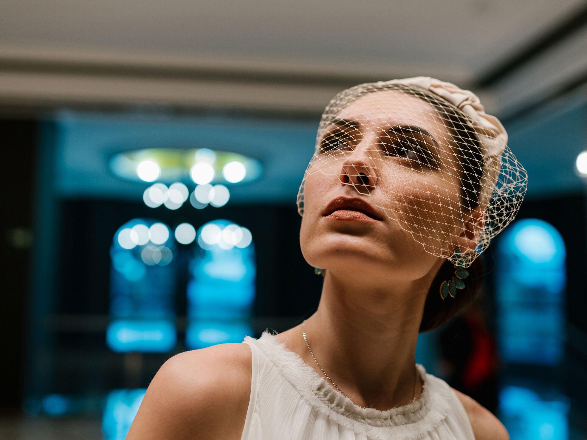 Bride wearing birdcage veil