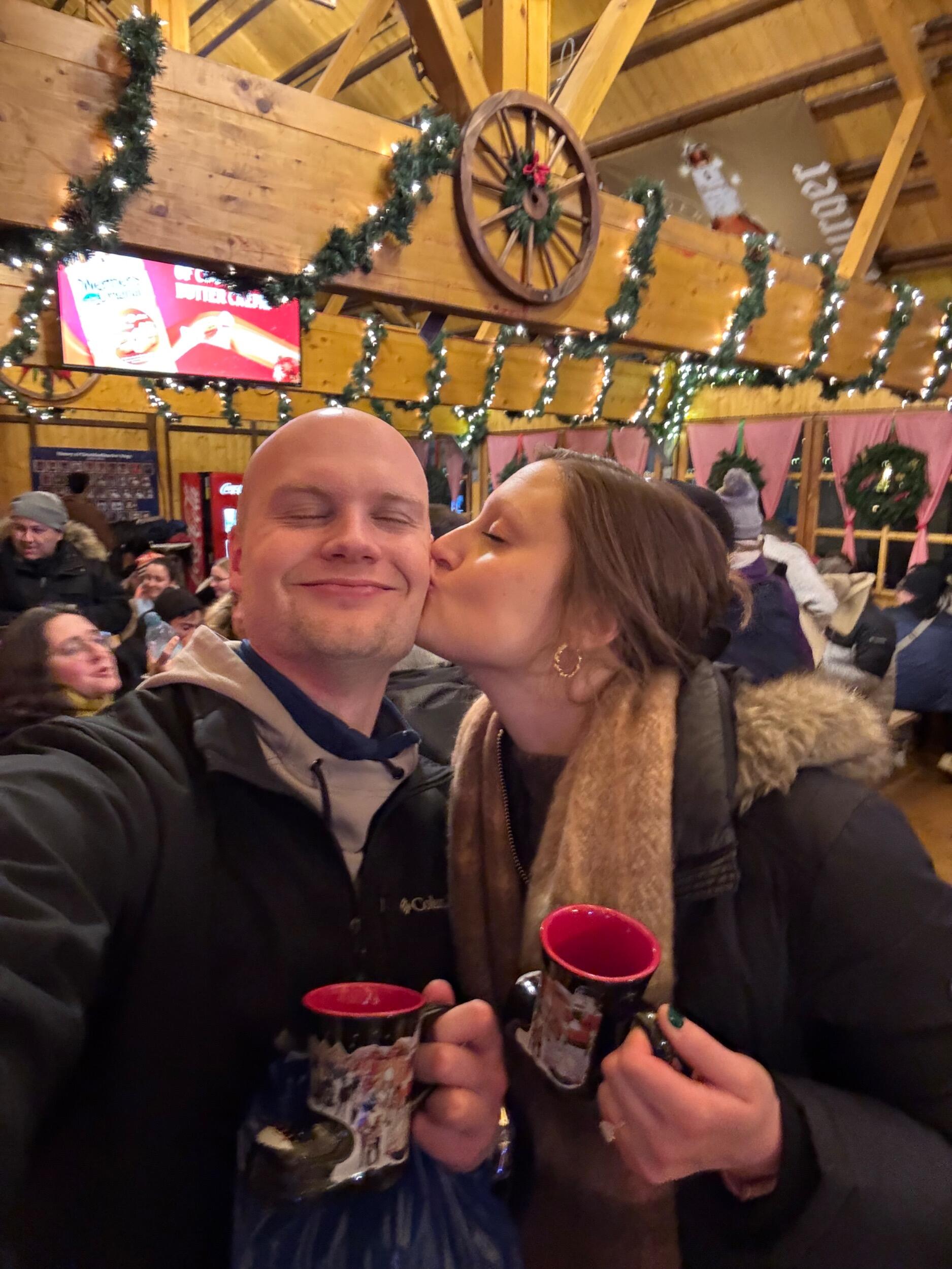 Glühwein, smooches, and all smiles at Christkindlmarket!