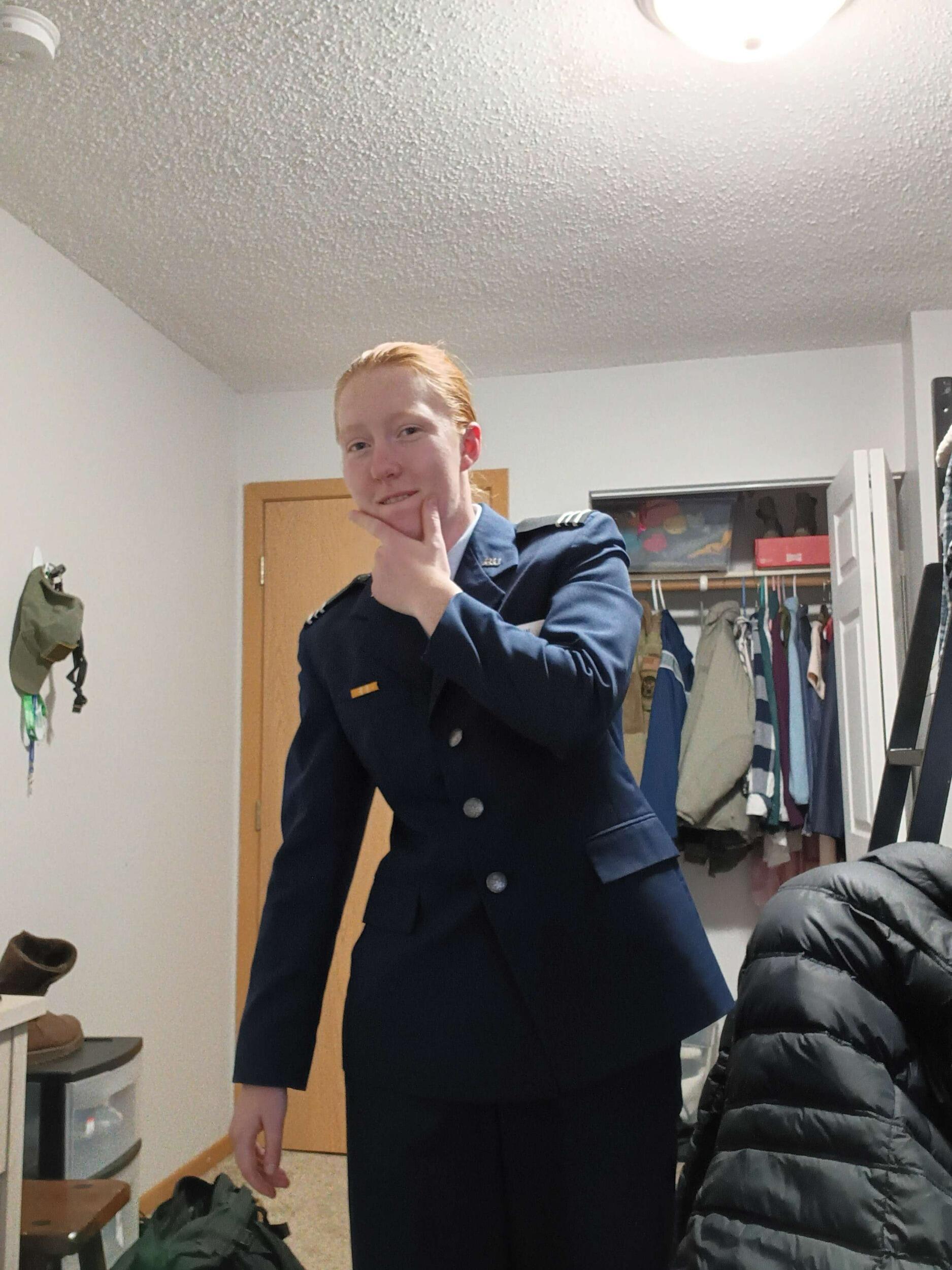 Lydia cosplaying as a "hot Air Force Officer" once she got her blues for the first time. Benjamin definitely, totally did not solicit the photo... 