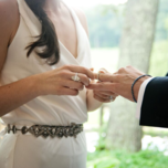Couple exchanging rings on wedding day