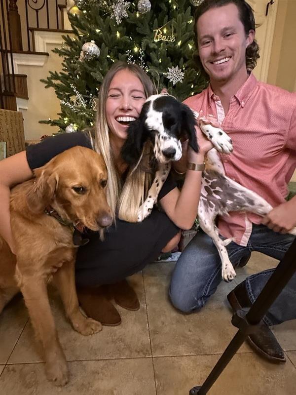 Cassidy and Garrett spent their first Christmas together with their two puppies, full of love, laughter, and holiday cheer.