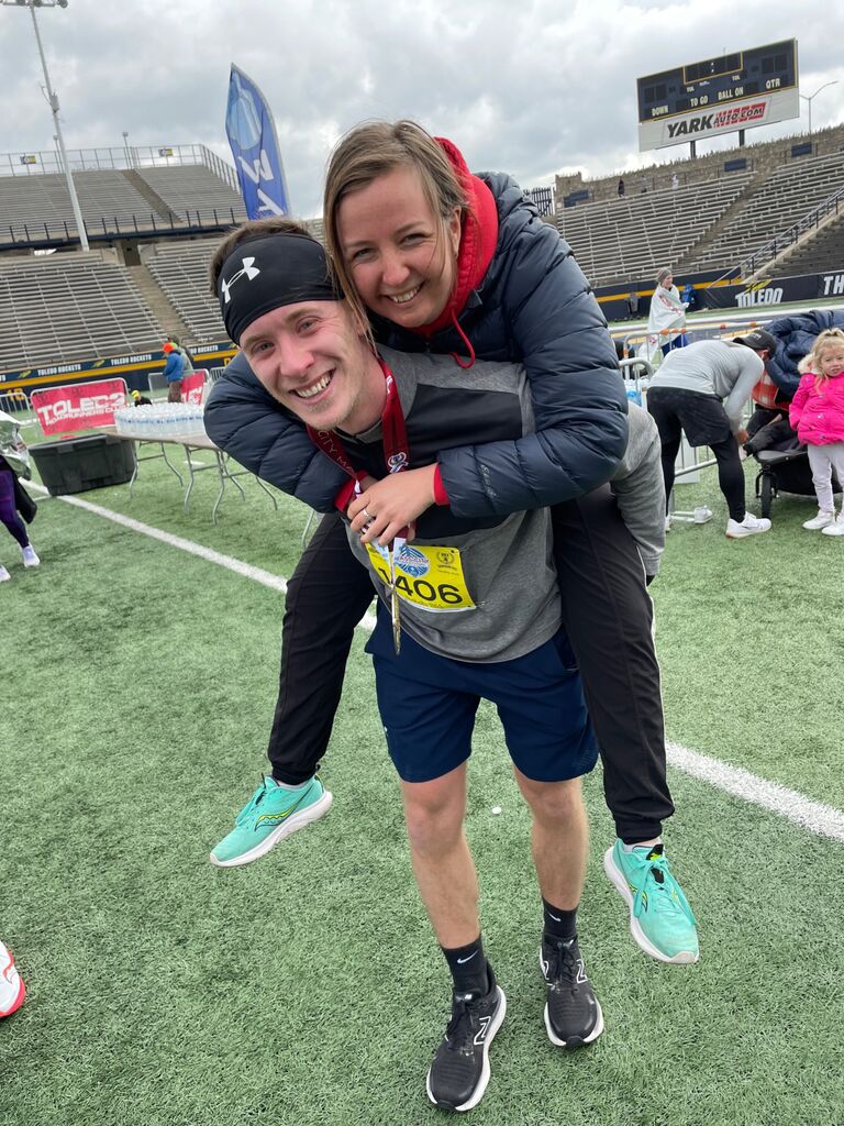 Aaron finished his first glass city marathon! And Jillian was right there by his side!