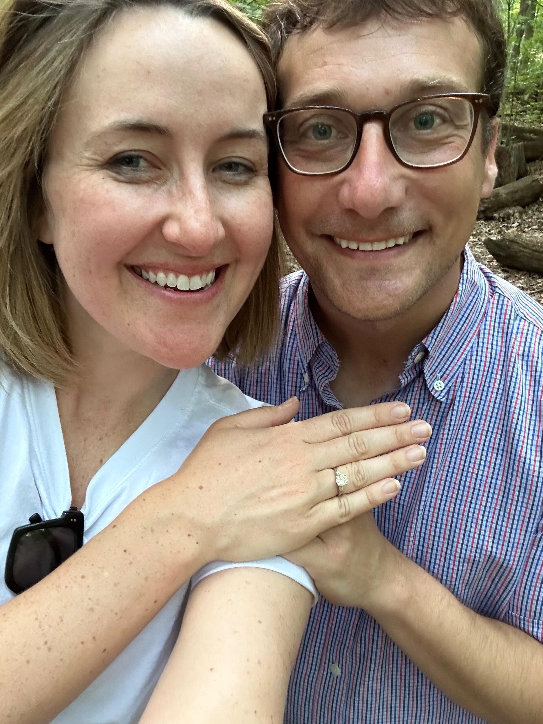 We're engaged! Eric proposed on a walk in the woods.