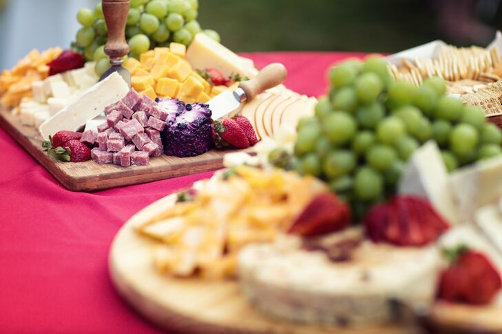 A Rainbow Colored Cheese And Appetizer Spread At The Backyard