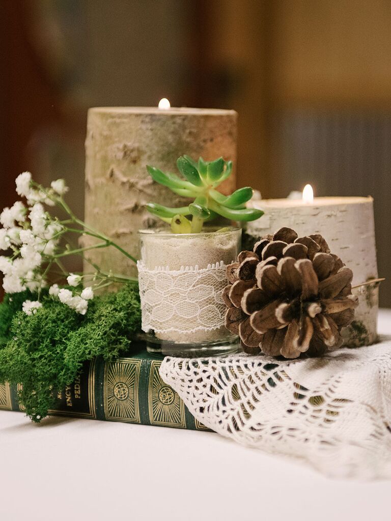 wedding centerpieces with candles and flowers