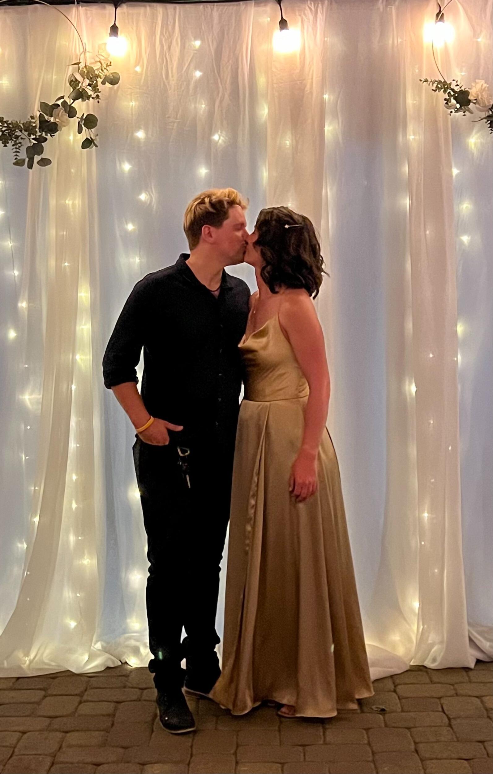 Shawn was in a wedding in June and ended up catching the bouquet! All of the other bridesmaids were bugging Evan to propose and he told them that he was popping the question the following week!