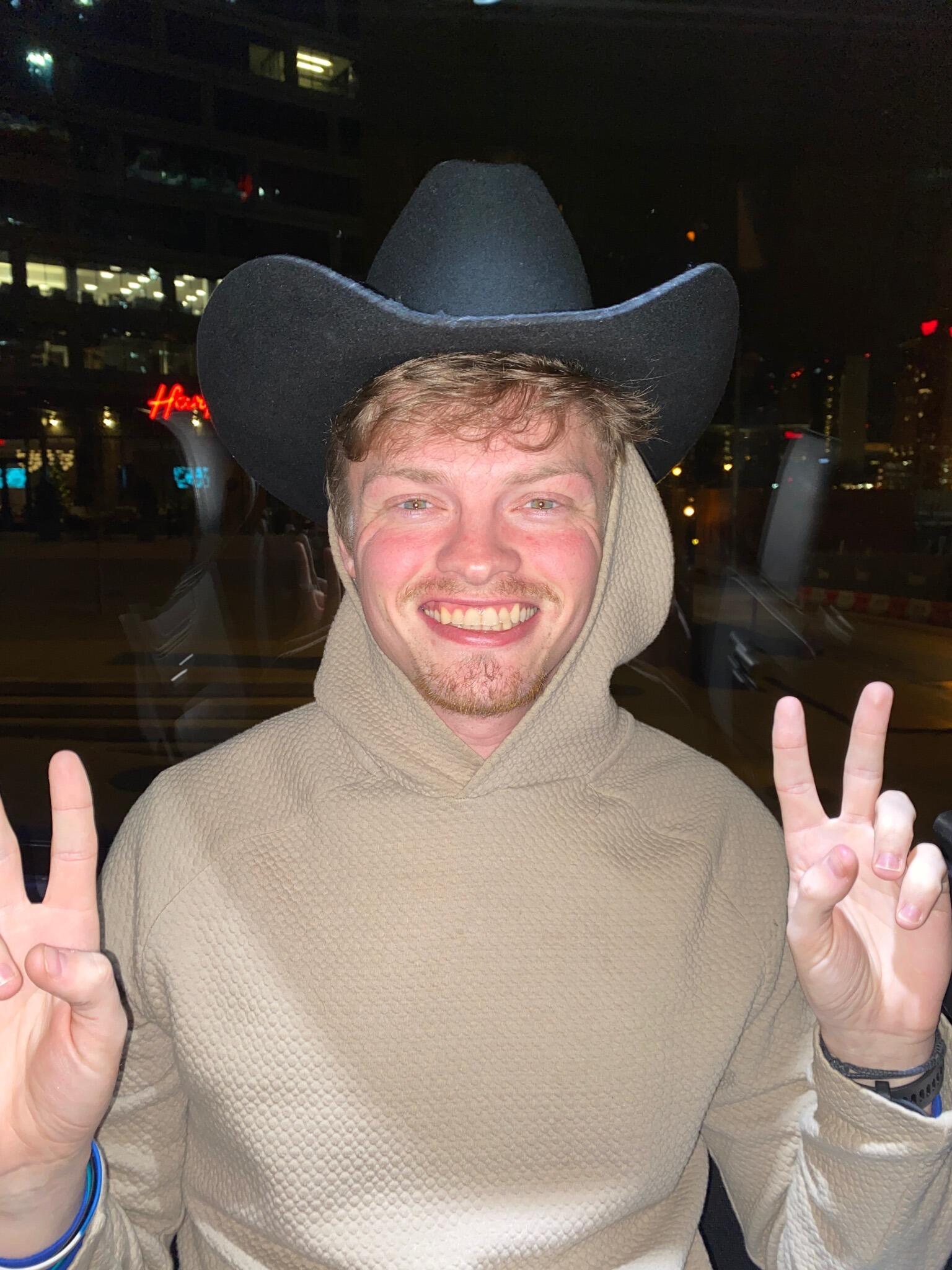 Jake in Nashville. Jake is throwing up the "peace sign". This might leave yourself wondering why, which is an interesting question. First, Jake values peace amogst everyone, and knows that it is the only way toward a sustainable future for us and future generations. Second, he values the rich history of Nashville, and how there is more similarities to where he is from than differences. This is also important to note when dealing with your fellow man.