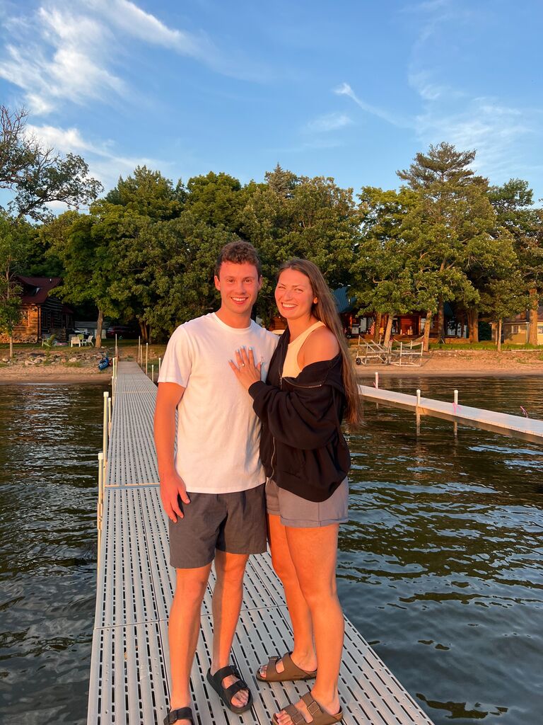 Then in June, Luke proposed to Emma while at a cabin with her family at sunset on the dock. He even managed to surprise her!