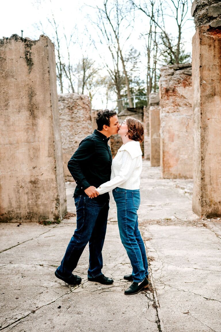 The photographer said "Jonathan, give Ashlee a spin!" but Jon didn't quite hear the full statement and his brain autofilled with "give her a kiss!"